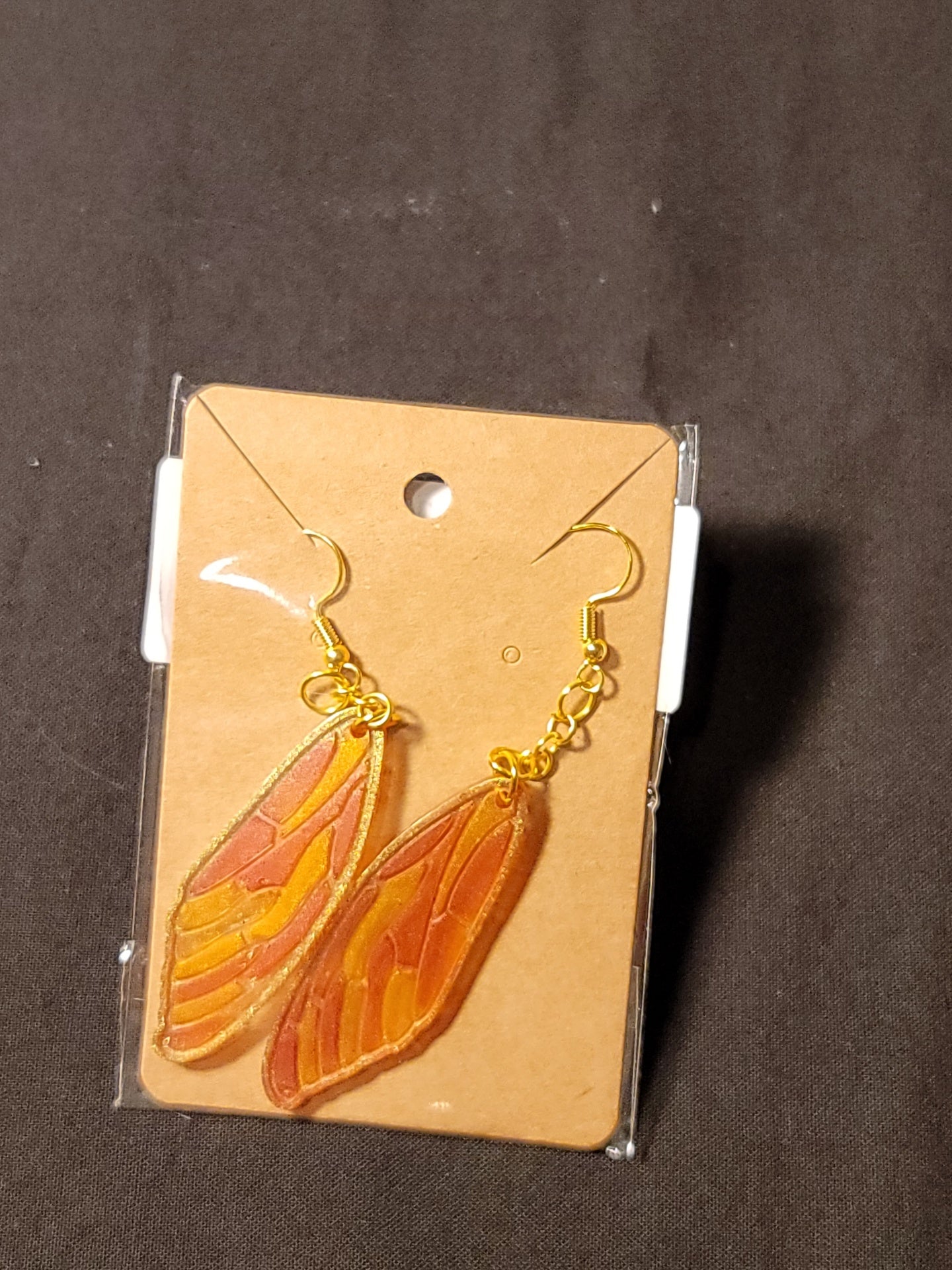 Orange-red long wings earrings